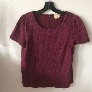 Floral patterned maroon shirt